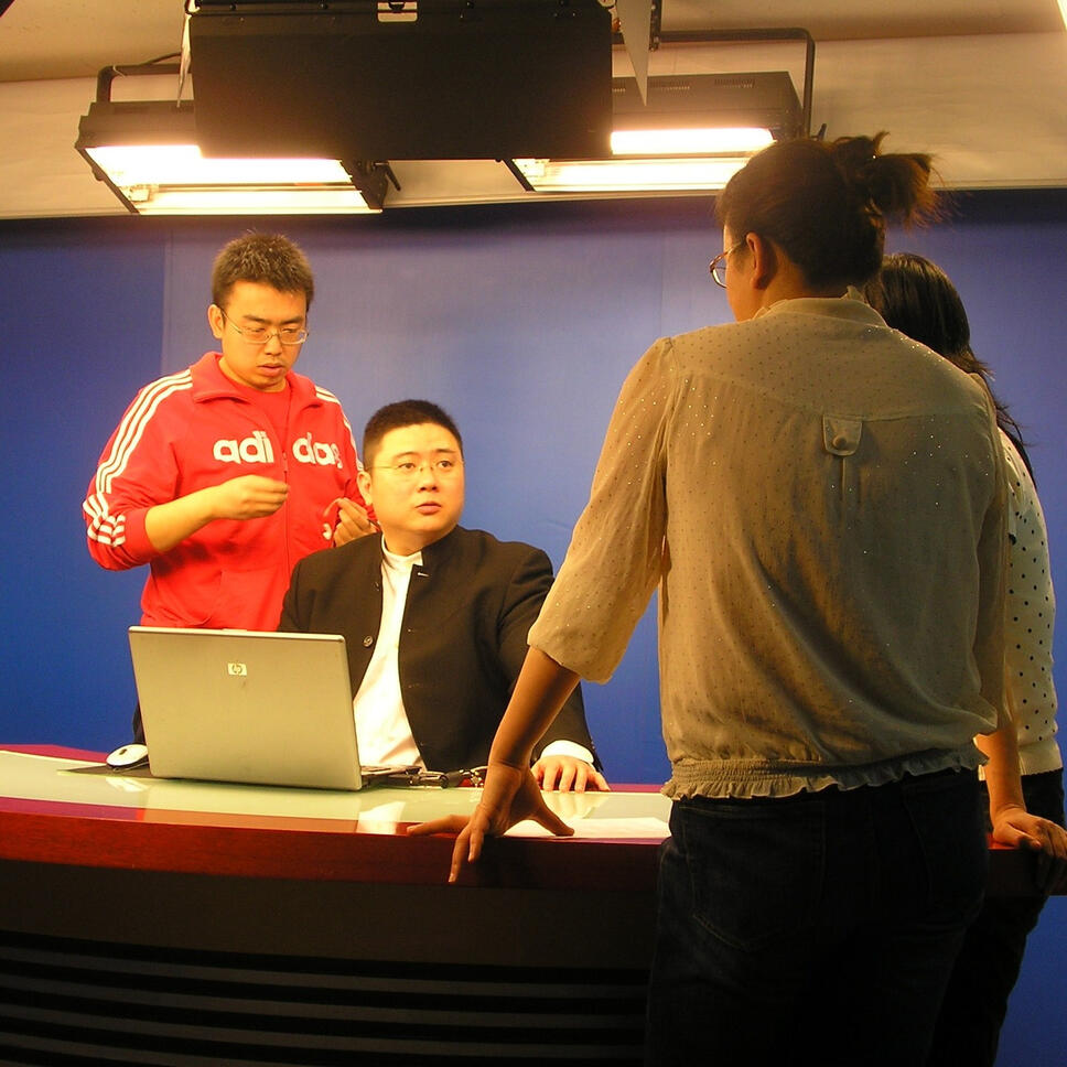 Shanghai TV studio, 2006 — stock market commentary